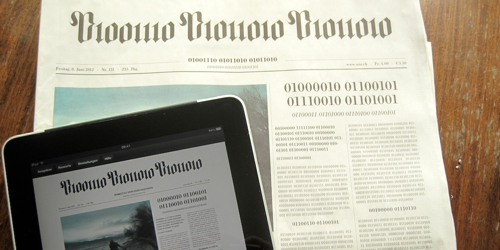 Swiss newspaper NZZ frontpage printed in binary code, human readable text on iPad (adapted) (Image by visualpun.ch [CC BY-SA 2.0] via Flickr)