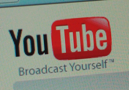 Youtube logo (adapted) (Image by Andrew Perry [CC BY 2.0] via Flickr)