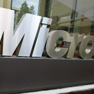 Microsoft sign outside building 99 (adapted) (Image by Robert Scoble [CC BY 2.0] via flickr)