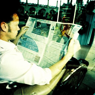 Reading the Newspaper (adapted) (Image by Nick Page [CC BY 2.0] via Flickr)