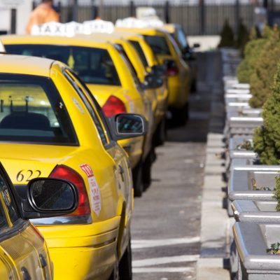 Taxi cabs at Penn Station (adapted) (Image by Marcin Wichary [CC BY 2.0] via Flickr)