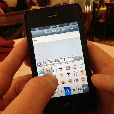 Texting Emoji (adapted) (Image by Intel Free Press [CC BY-SA 2.0] via Flickr)