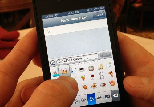 Texting Emoji (adapted) (Image by Intel Free Press [CC BY-SA 2.0] via Flickr)