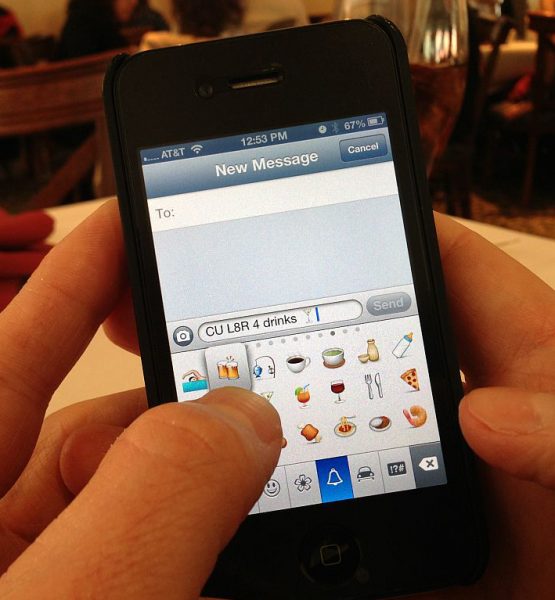 Texting Emoji (adapted) (Image by Intel Free Press [CC BY-SA 2.0] via Flickr)