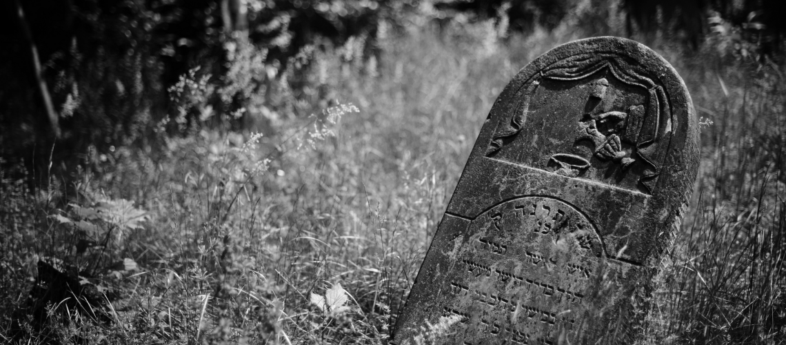 Tombstone in Jewish cemetery (adapted) (Image by Jakub Jankiewicz [CC BY-SA 2.0] via Flickr)