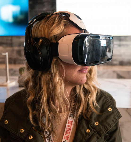 Woman Using a Samsung VR Headset at SXSW (adapted) (Image by Nan Palmero [CC BY 2.0] via Fickr)