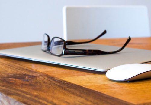 Still Life of Glasses on MacBook Air with Mouse (adapted) (Image by Image Catalog [CC0 Public Domain] via Flickr)