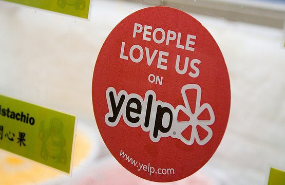 Yelp Sticker and Reviews (adapted) (Image by StickerGiant Custom Stickers [CC BY 2.0] via Flickr)