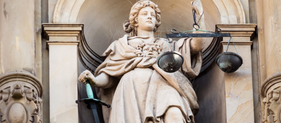 Justitia (adapted) (Image by Markus Daams [CC BY 2.0] via flickr)