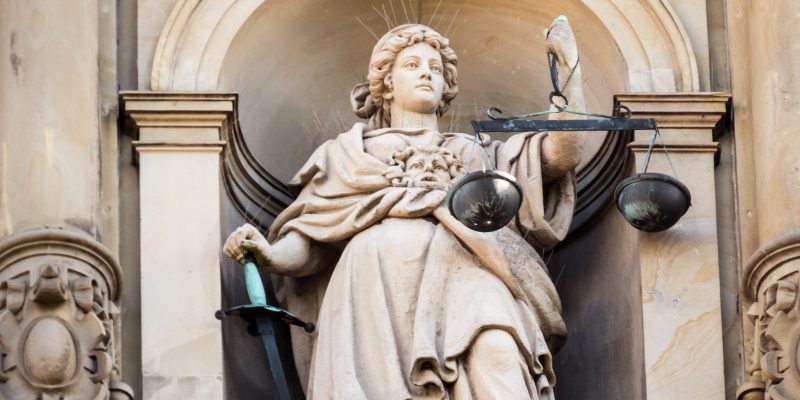 Justitia (adapted) (Image by Markus Daams [CC BY 2.0] via flickr)