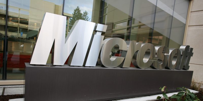 Microsoft sign outside building 99 (adapted) (Image by Robert Scoble [CC BY 2.0] via Flickr)