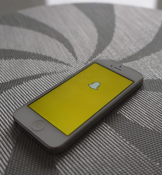 Snapchat (adapted) (Image by AdamPrzezdziek [CC BY-SA 2.0] via Flickr)