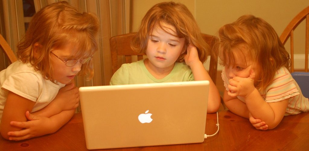 Hersman Girls - Already on Computers... (adapted) (Image by Erik (HASH) Hersman [CC BY 2.0] via flickr)