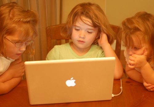 Hersman Girls - Already on Computers... (adapted) (Image by Erik (HASH) Hersman [CC BY 2.0] via flickr)