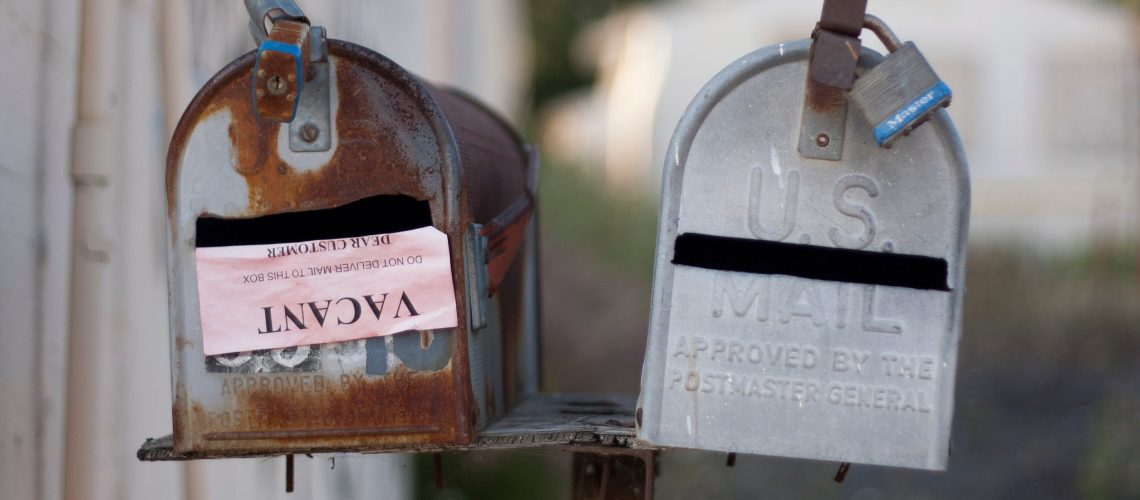 Rusted Mailboxes (adapted) (Image by aaron nunez [CC BY 2.0] via Flickr)