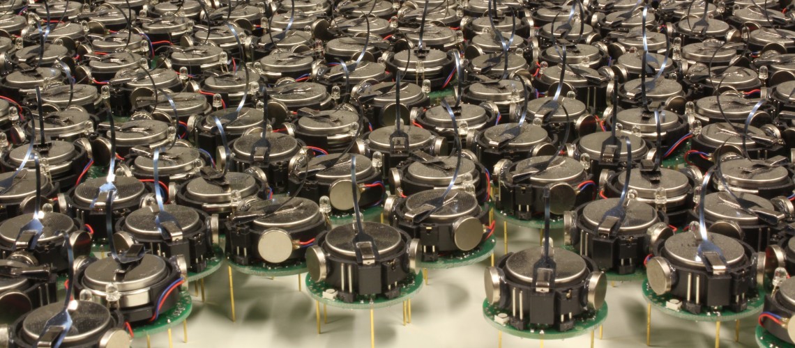 Kilobot Robot Swarm (Image by asuscreative [CC BY SA], via Wikimedia Commons)