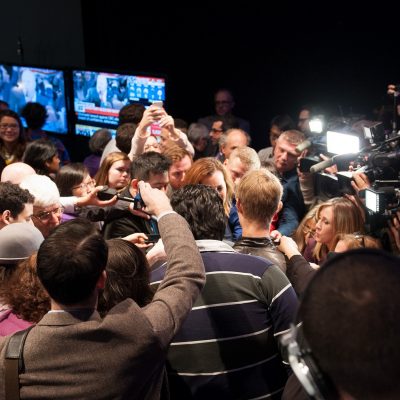 Media Scrum (adpted) (Image by Olivia Chow [CC BY 2.0] via Flickr)