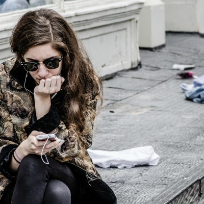 Texting in NYC (adapted) (Image by Michele Ursino [CC BY-SA 2.0] via flickr)