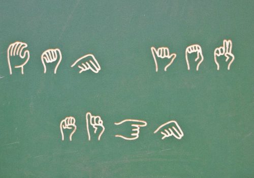 Learn sign language at the playground (adapted) (Image by Valerie Everett [CC BY-SA 2.0] via Flickr)