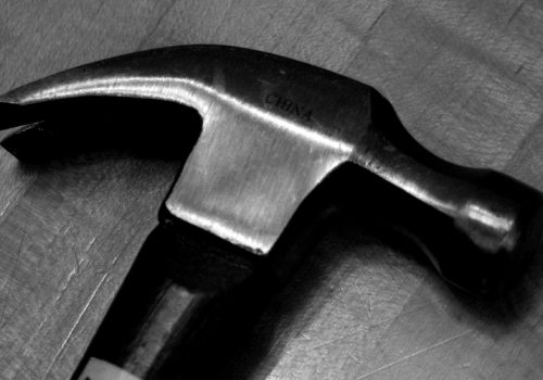 B&W Hammer (adapted) (Image by Justin Baeder [CC BY 2.0] via Flickr)