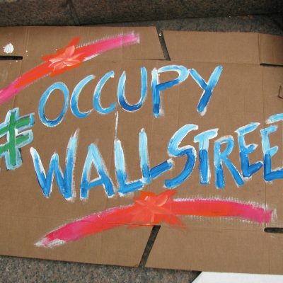 Occupy Wall Street (adapted) (Image by Eden, Janine and Jim [CC BY 2.0] via flickr)