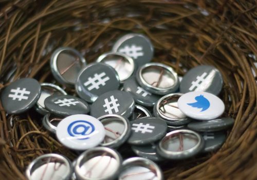 Twitter Buttons at OSCON adapted) (Image by Garrett Heath [8CC BY 2.0], via flickr)