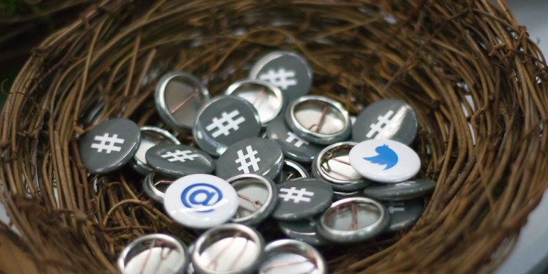 Twitter Buttons at OSCON adapted) (Image by Garrett Heath [8CC BY 2.0], via flickr)
