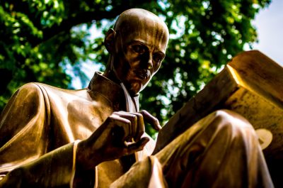 Statue of man reading (adapted) (Image by Carl Cerstrand [CC0 Public Domain] via Unsplash)