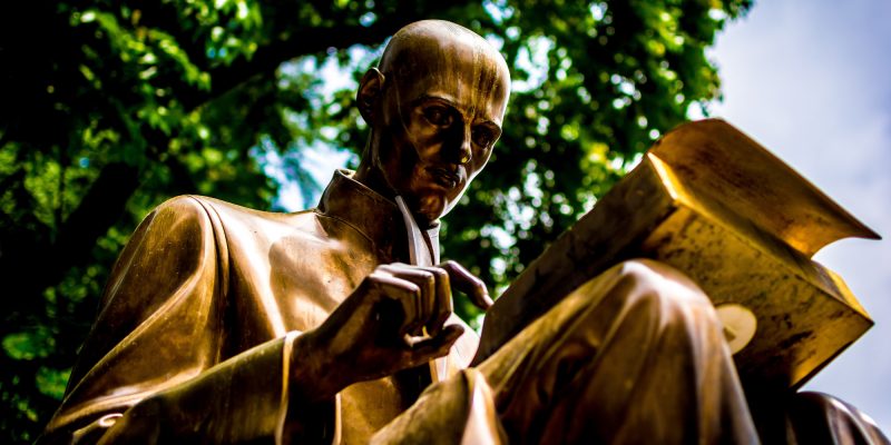 Statue of man reading (adapted) (Image by Carl Cerstrand [CC0 Public Domain] via Unsplash)