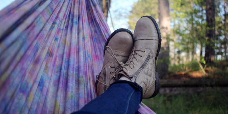 Hammrock, relax, person and boot (adapted) (Image by Nicole Harrington [CC0 Public Domain] via Unsplash)