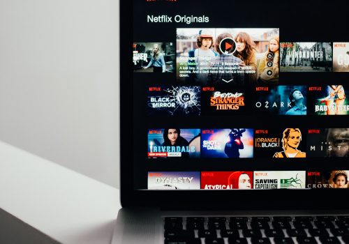 Browsing Netflix Streaming (adapted) (Image by Charles Deluvio [CC0 Public Domain] via Unsplash)