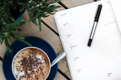 Diary desk business meeting and meeting (Image by Anete Lüsina [CC0 Public Domain] via Unsplash)