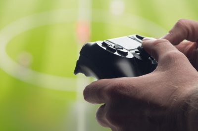 Man holding Gamepad / Image by olegkruglyak3 via stock-adobe-com