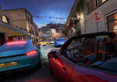 Mehrere Autos, die sich in Forza Horizon 5 ein Nachtrennen durch die engen Gassen einer Stadt liefern.