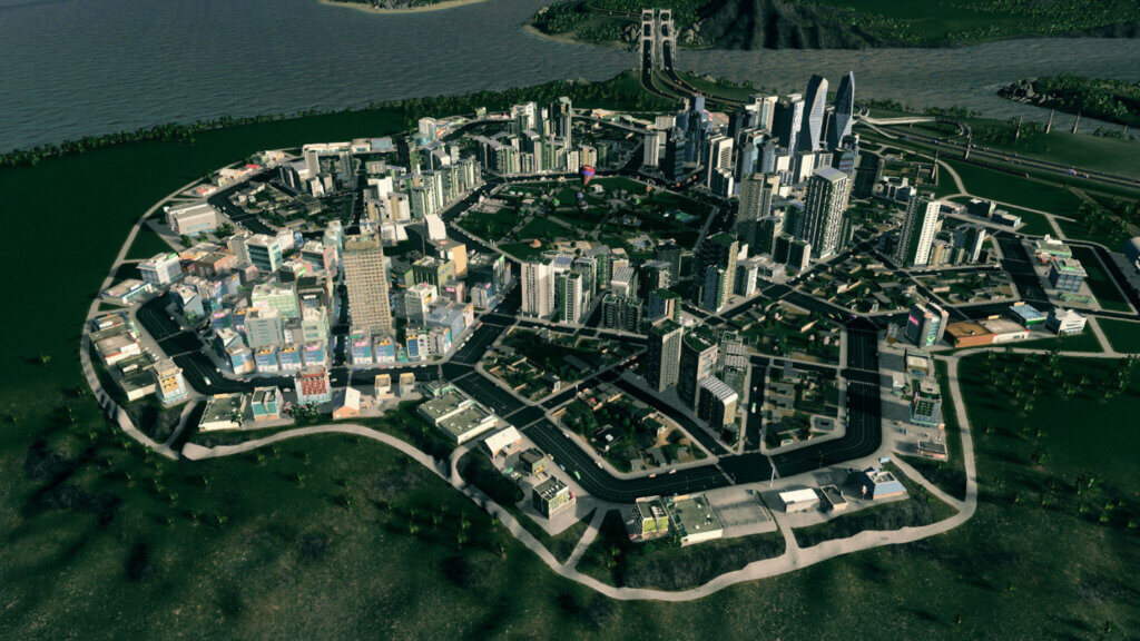 Eine Stadtteil in Cities Skylines, dessen Hauptverkehrswürfel wie Hex-Felder angeordnet sind mit einem großen Park in der Mitte