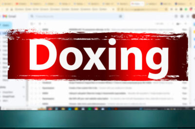 Ein aufgeklappter Laptop mit geöffnetem E-Mail-Programm. Davor ist das Wort "Doxing" mit warnend rotem Hintergrund.