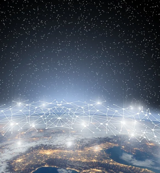 Eine stilisierte Darstellung der Erde aus dem All bei Nacht, überzogen von einem leuchtenden Netzwerk aus verbundenen Punkten und Linien, das globale Datenverbindungen oder ein digitales Weltmodell symbolisiert.