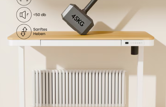Höhenverstellbarer Schreibtisch mit aufgelegtem Gewicht zur Demonstration der Stabilität und Tragfähigkeit des Gestells