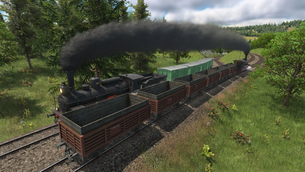 Zwei Dampfloks mit unterschiedlichen Wagons fahren aneinander vorbei.